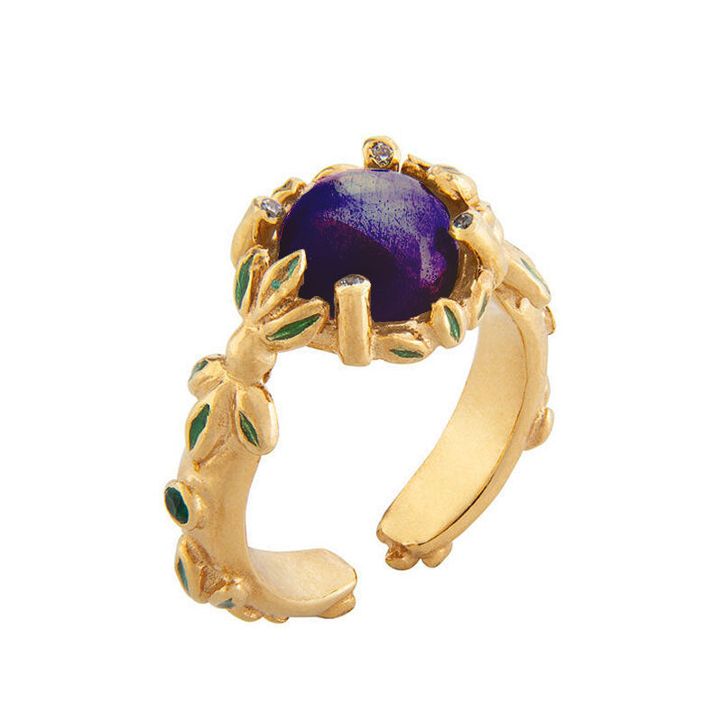 Damenring mit kunstvollem Blumendesign und violettem Edelstein Shop Nory