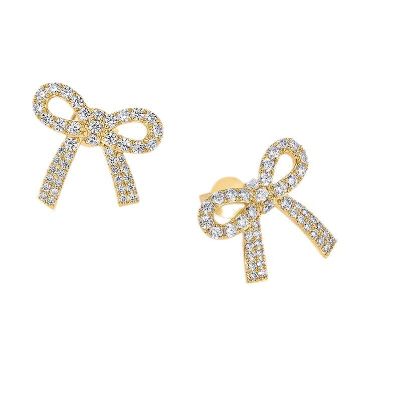 Damen Ohrstecker im eleganten Schleifen-Design mit funkelnden Zirkonia-Details Shop Nory