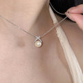 Damen Halskette mit funkelndem Perlenanhänger und eleganter Zirkonia-Fassung Shop Nory