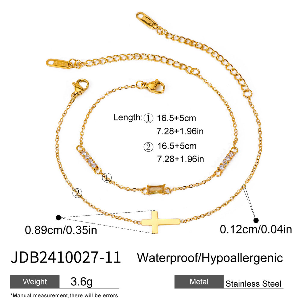Damen Doppelarmband mit funkelnden Zirkonia und Kreuzanhänger Shop Nory