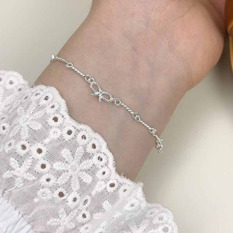 Damen zartes Armband mit einzigartigem Schleifenmuster Shop Nory