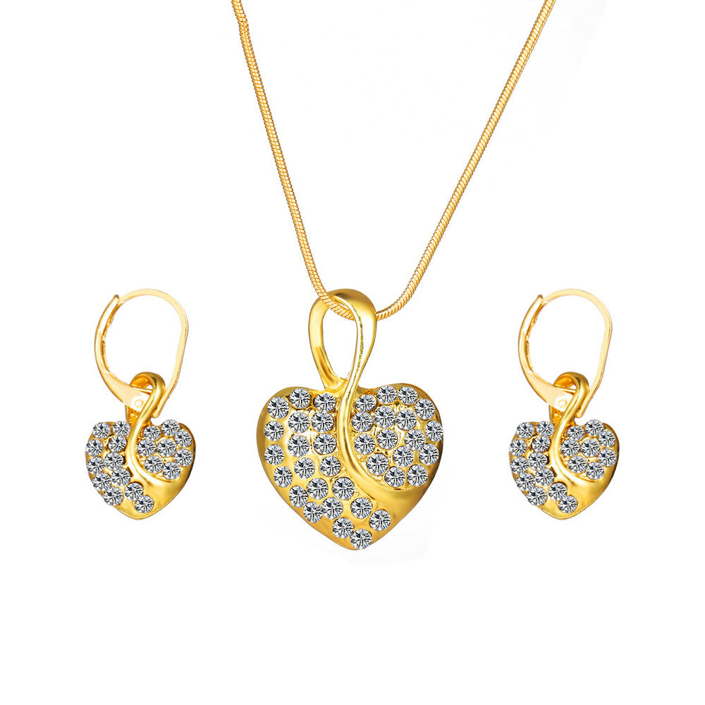 Damen Schmuckset mit funkelndem Herzanhänger und eleganten Ohrringen Shop Nory