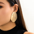 Damen Ohrstecker im eleganten Muschel-Design
