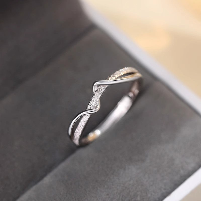 Damen zart geschwungener Ring mit funkelnden Zirkonia Shop Nory