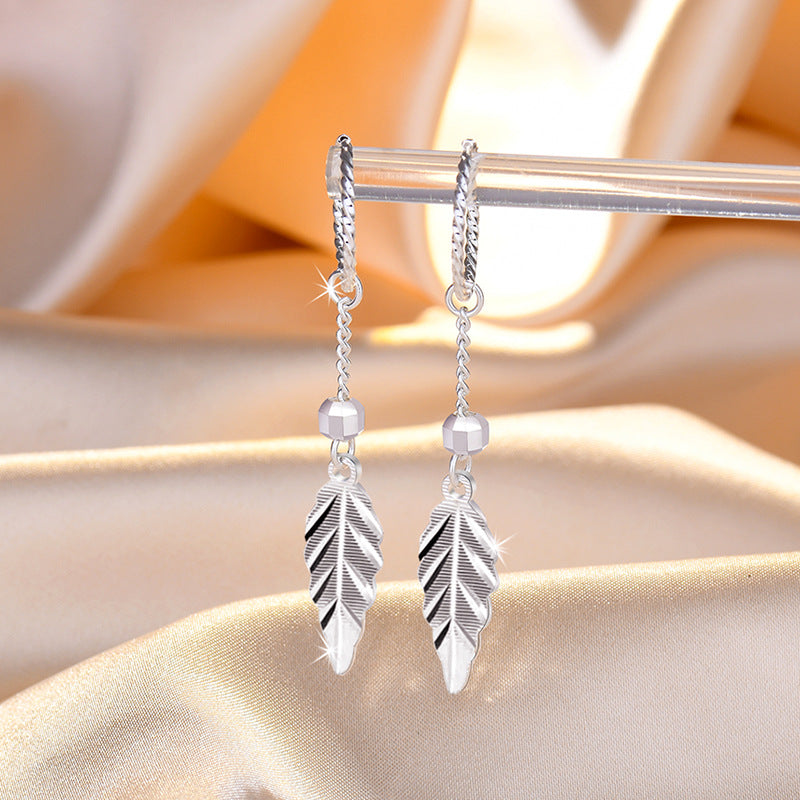 Damen Hängende Ohrringe mit filigranem Blattdesign und eleganten Akzenten Shop Nory