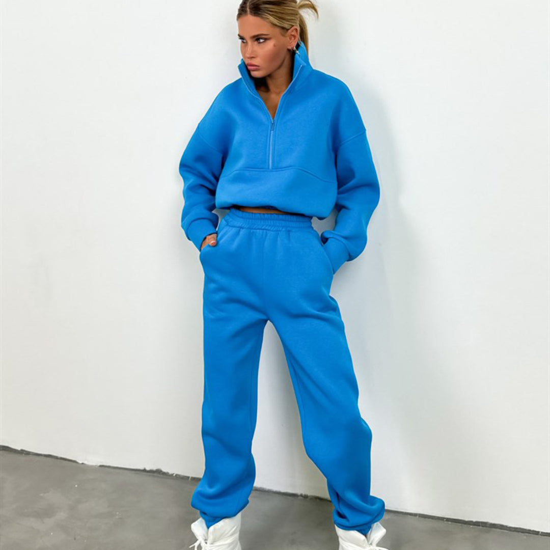 Damen Cropped-Halbzip-Sweatshirt mit hohem Stehkragen und elastischer High-Waist Jogginghose Set Shop Nory