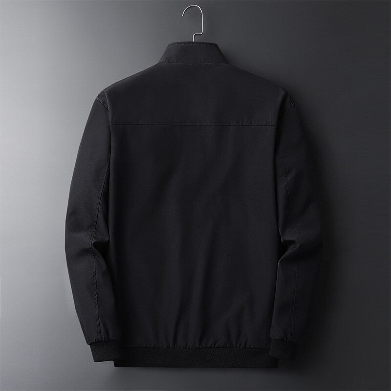 Herren Leichte Softshell-Blousonjacke mit Stehkragen, Reißverschlusstaschen und gerippten Bündchen Shop Nory