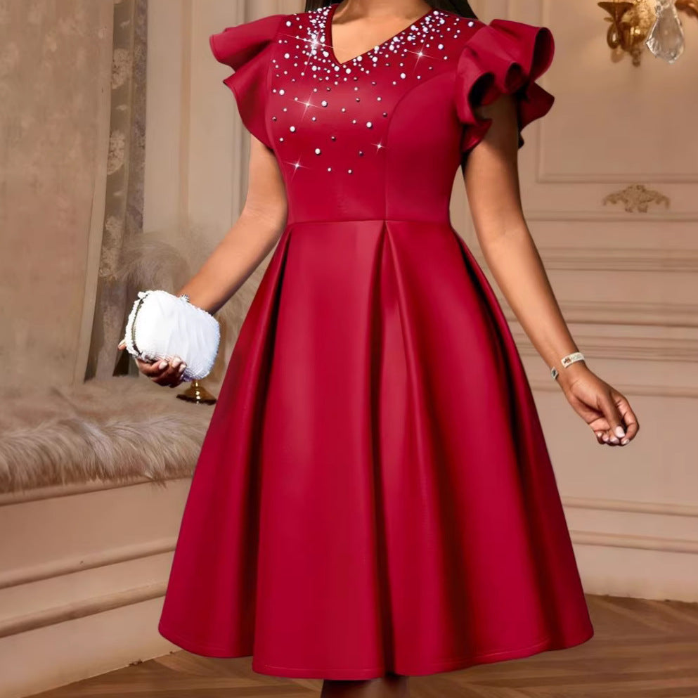 Damen A-Linien Kleid mit glitzernden Perlen und voluminösen Ärmeln