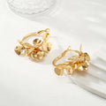 Damen Creolen mit kunstvollem Blumenornament Shop Nory