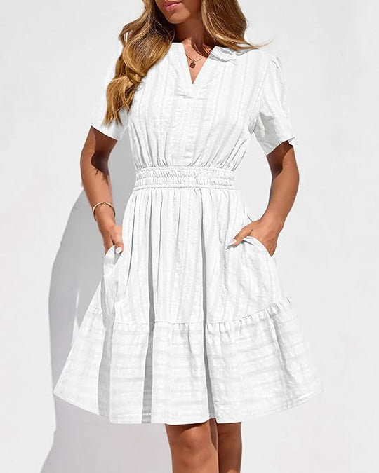 Damen Tailliertes Stufen-Midikleid mit Smokbund, V‑Ausschnitt und Eingrifftaschen Shop Nory