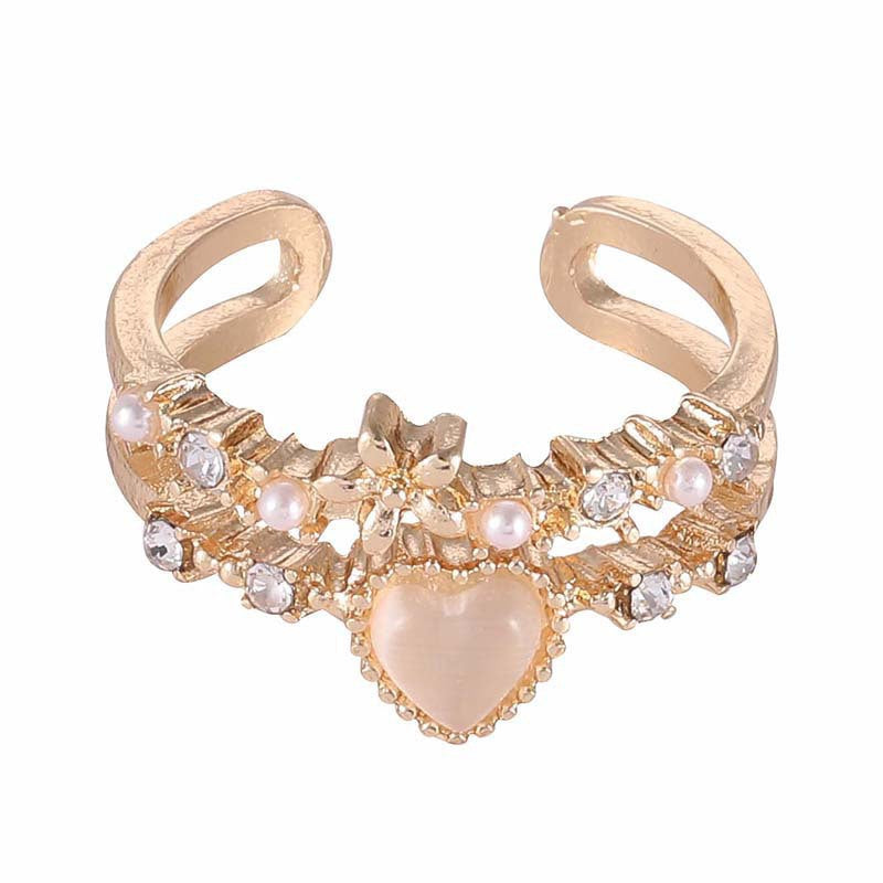 Damenring mit romantischem Herzmotiv und funkelnden Details Shop Nory
