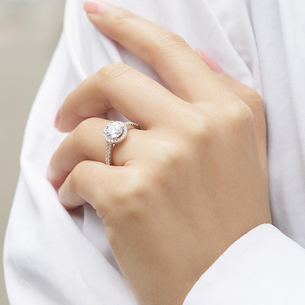 Damen Ohrringe mit rundem Zirkonia-Besatz und filigraner Fassung Shop Nory