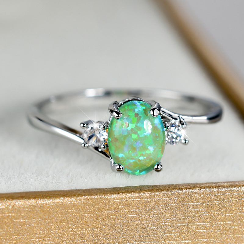Damen Ring mit Opalstein und funkelnden Zirkonia Shop Nory