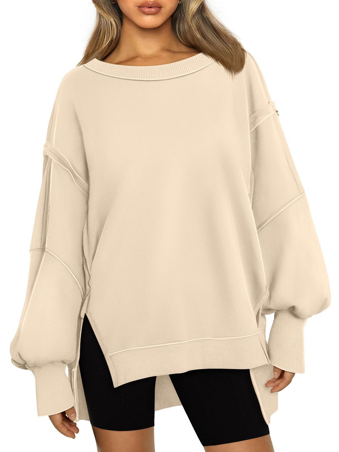 Damen Weiches Longline-Sweatshirt mit Ballonärmeln, seitlichen Schlitzen und geripptem Saum Shop Nory