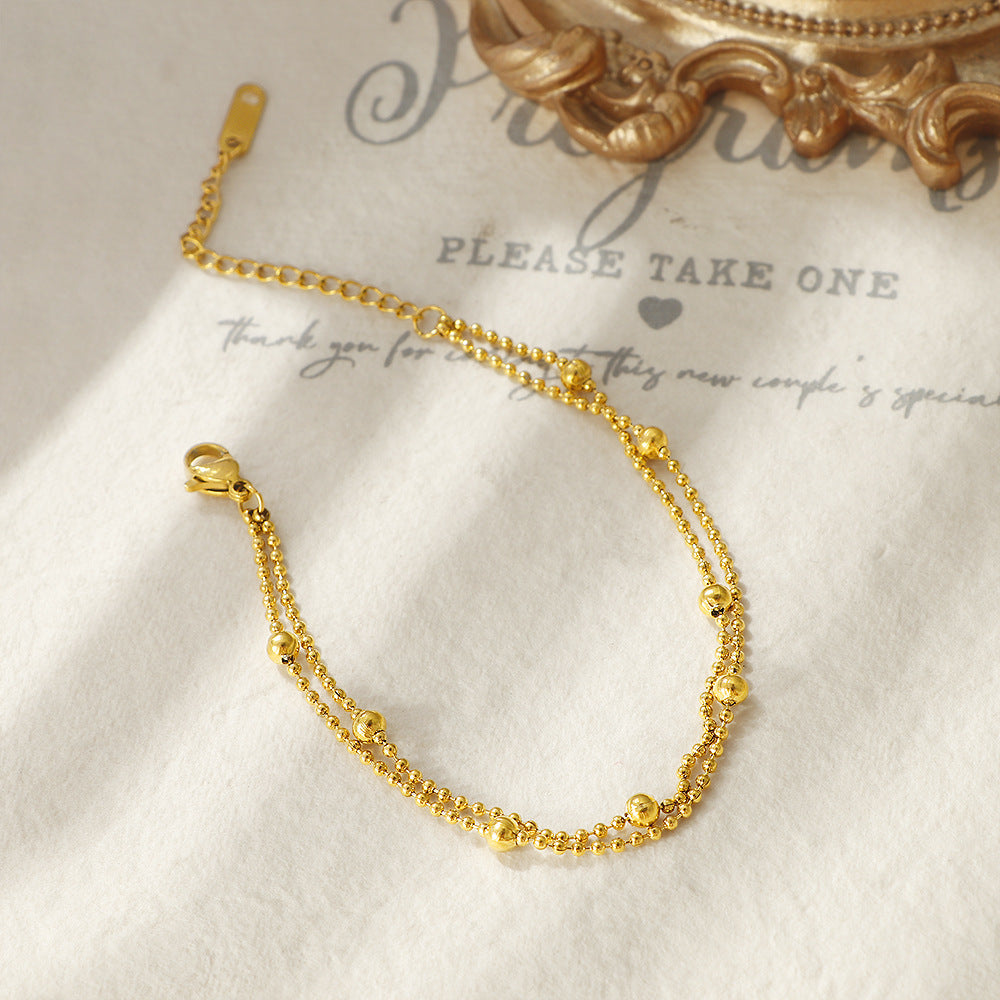 Damen filigranes Armband mit glänzenden Perlen und eleganter Kettengestaltung Shop Nory