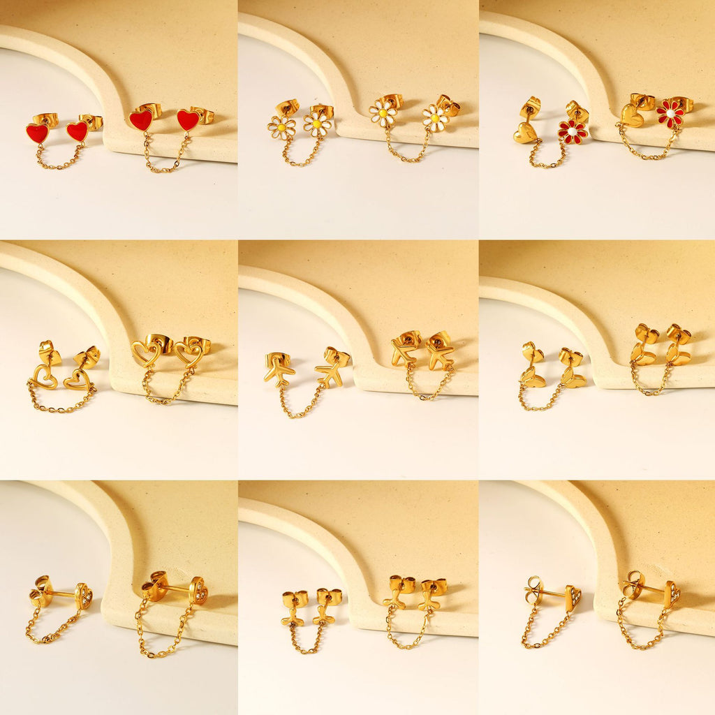 Damen Ohrstecker im Herz-Design mit goldenen Akzenten und Kettenverbindung Shop Nory
