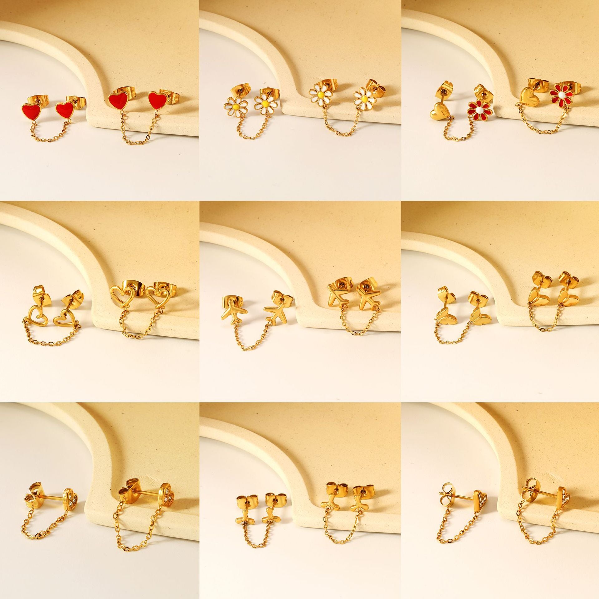 Damen Ohrstecker im Herz-Design mit goldenen Akzenten und Kettenverbindung Shop Nory