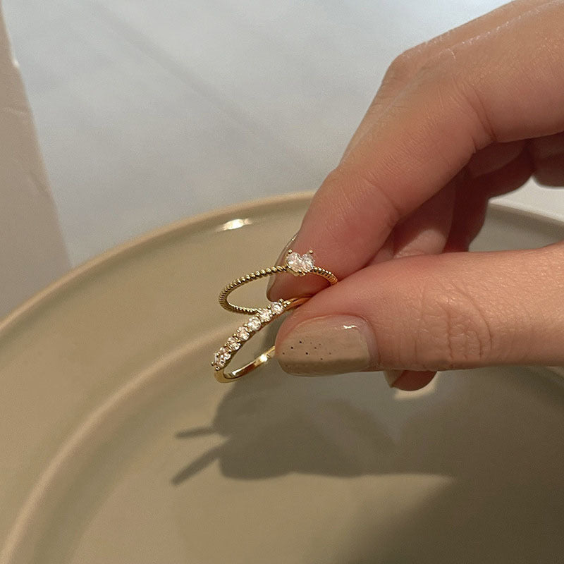 Damenring mit elegantem Zirkonia-Besatz und filigranem Design Shop Nory