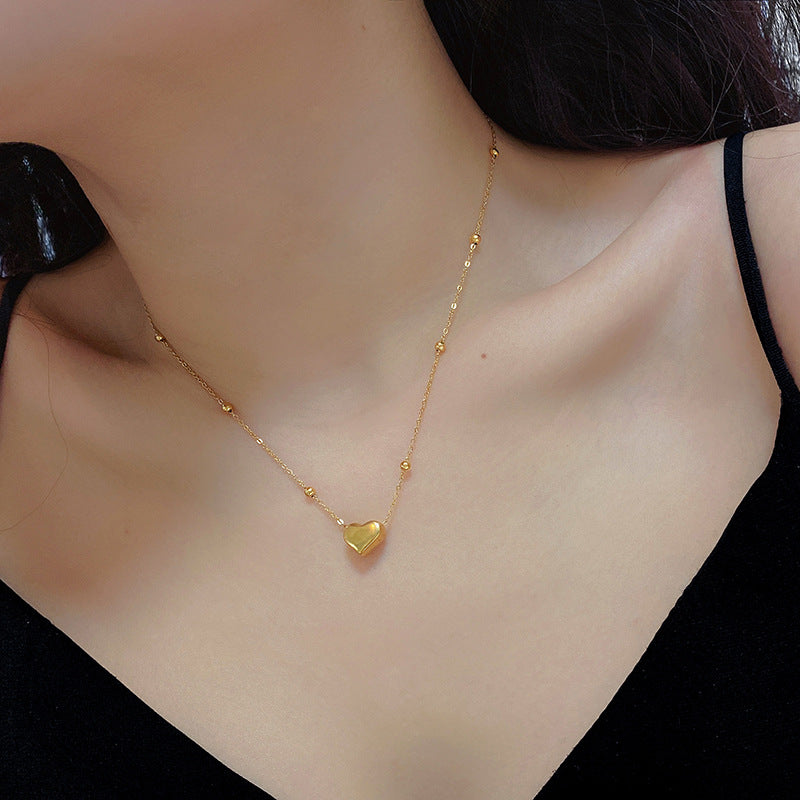 Damen zarte Halskette mit Herzanhänger und goldenen Akzenten Shop Nory