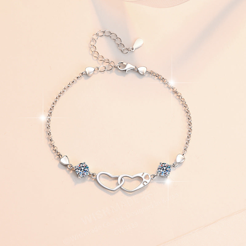 Damenarmband mit elegantem Herzdesign und funkelnden Zirkonia Shop Nory