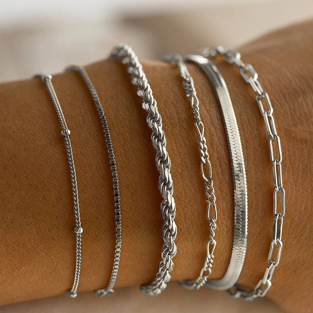 Damen Armreifen-Set mit funkelnden Zirkonia und eleganten Kettendesigns Shop Nory