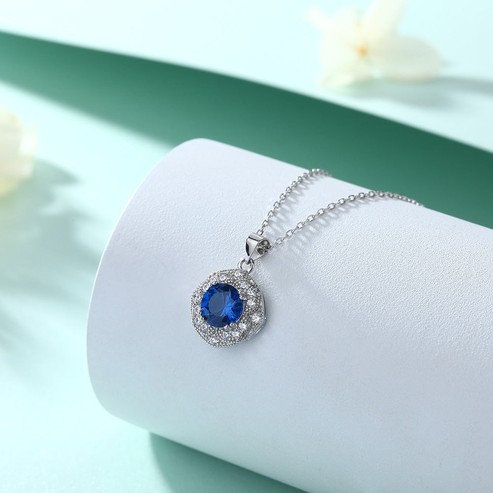 Damen Ohrstecker mit facettierten blauen Kristallen und funkelndem Zirkonia-Rahmen Shop Nory