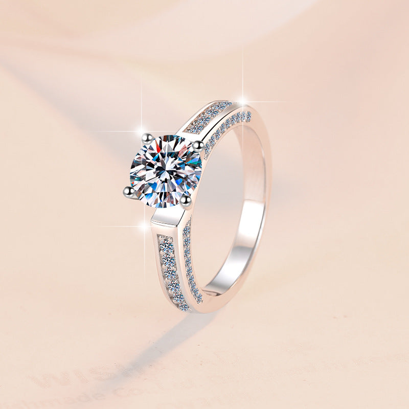 Damen Glänzender Zirkonia-Solitär Ring mit eleganter Pavé-Verzierung Shop Nory