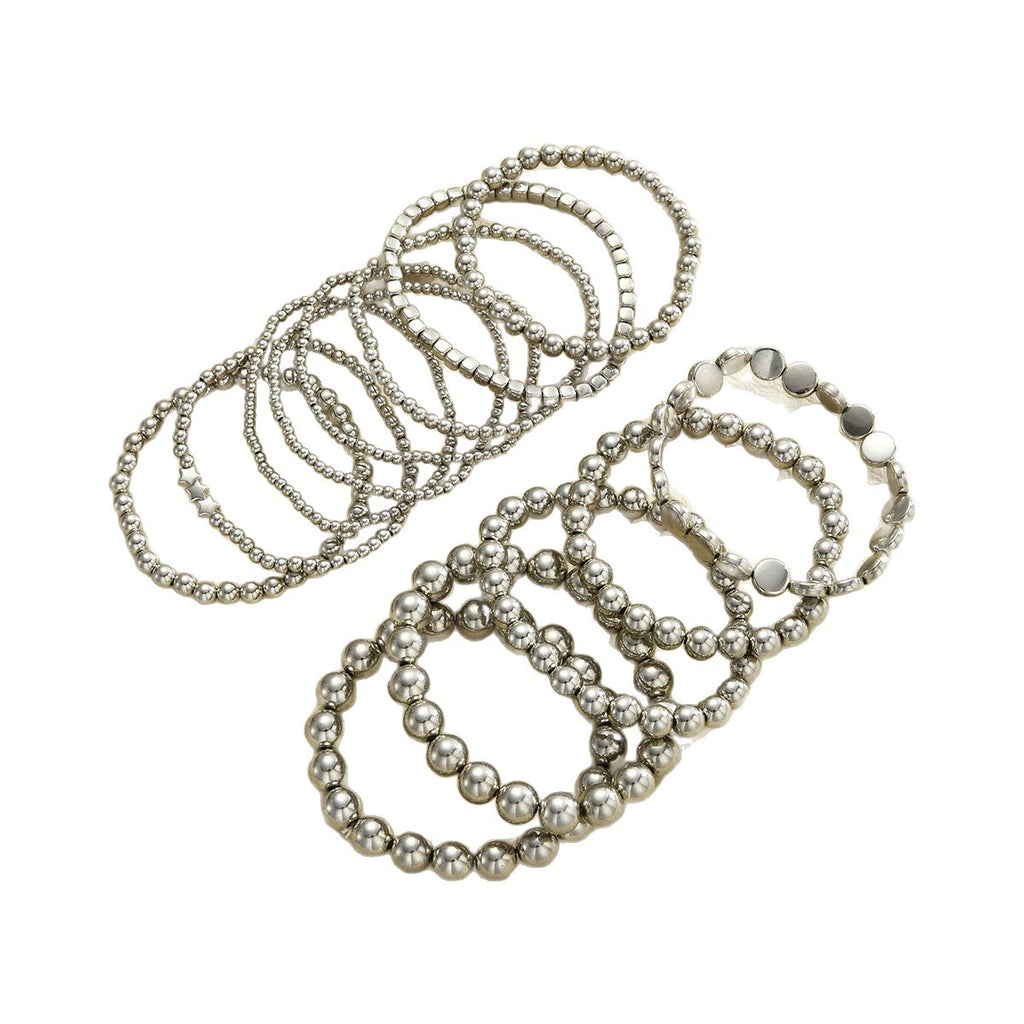 Damen Armreif-Set mit funkelnden metallischen Akzenten Shop Nory