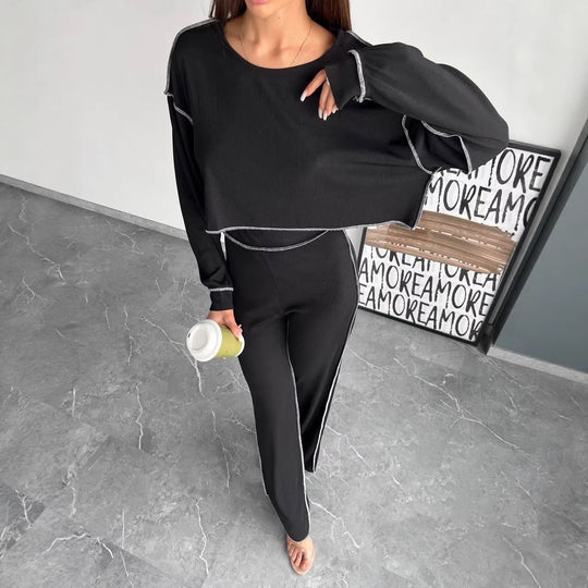 Damen Cropped Oversized-Sweatshirt mit Overlocknähten und High-Waist ausgestellter Hose Set Shop Nory