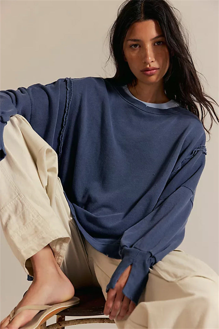 Damen oversized Sweatshirt mit Ballonärmeln, offenen Saumnähten und seitlichen Schlitzen Shop Nory