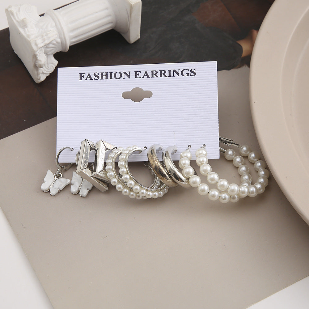 Damen Ohrringe Set mit eleganten Perlen und modernem Design Shop Nory