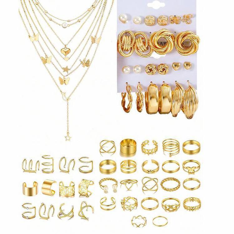 Damen Schmuckset mit mehrlagigen Ketten und vielfältigen Ringen Shop Nory