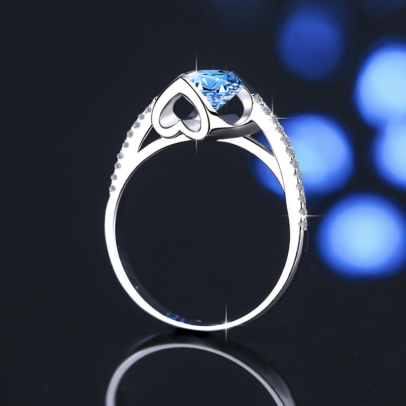 Damenring mit elegantem, facettiertem Hauptstein und funkelnden Zirkonia Shop Nory