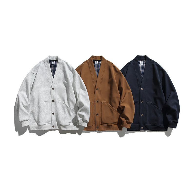 Unisex Boxy-Cardigan-Jacke mit V-Ausschnitt, aufgesetzten Taschen und kariert gefüttertem Innenfutter Shop Nory