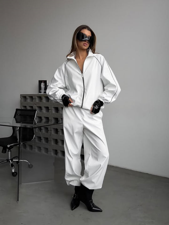 Damen Zweiteiliges Loungewear-Set mit Stehkragen-Zipjacke und weiter Bundfaltenhose Shop Nory