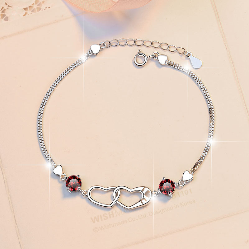Damenarmband mit elegantem Herzdesign und funkelnden Zirkonia Shop Nory