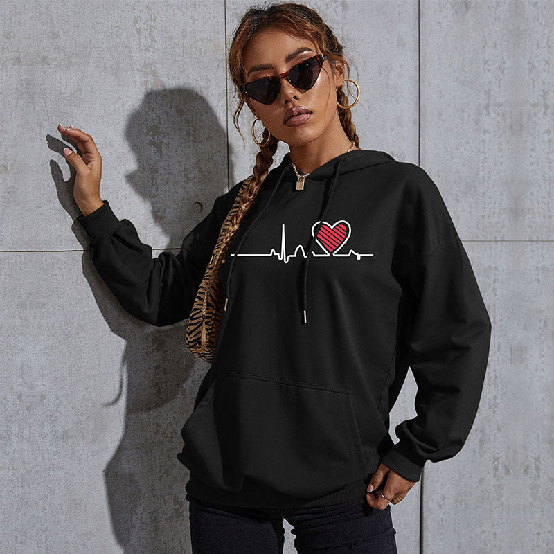 Damen Oversize-Kapuzenpullover mit Herz-EKG‑Print und Kängurutasche Shop Nory
