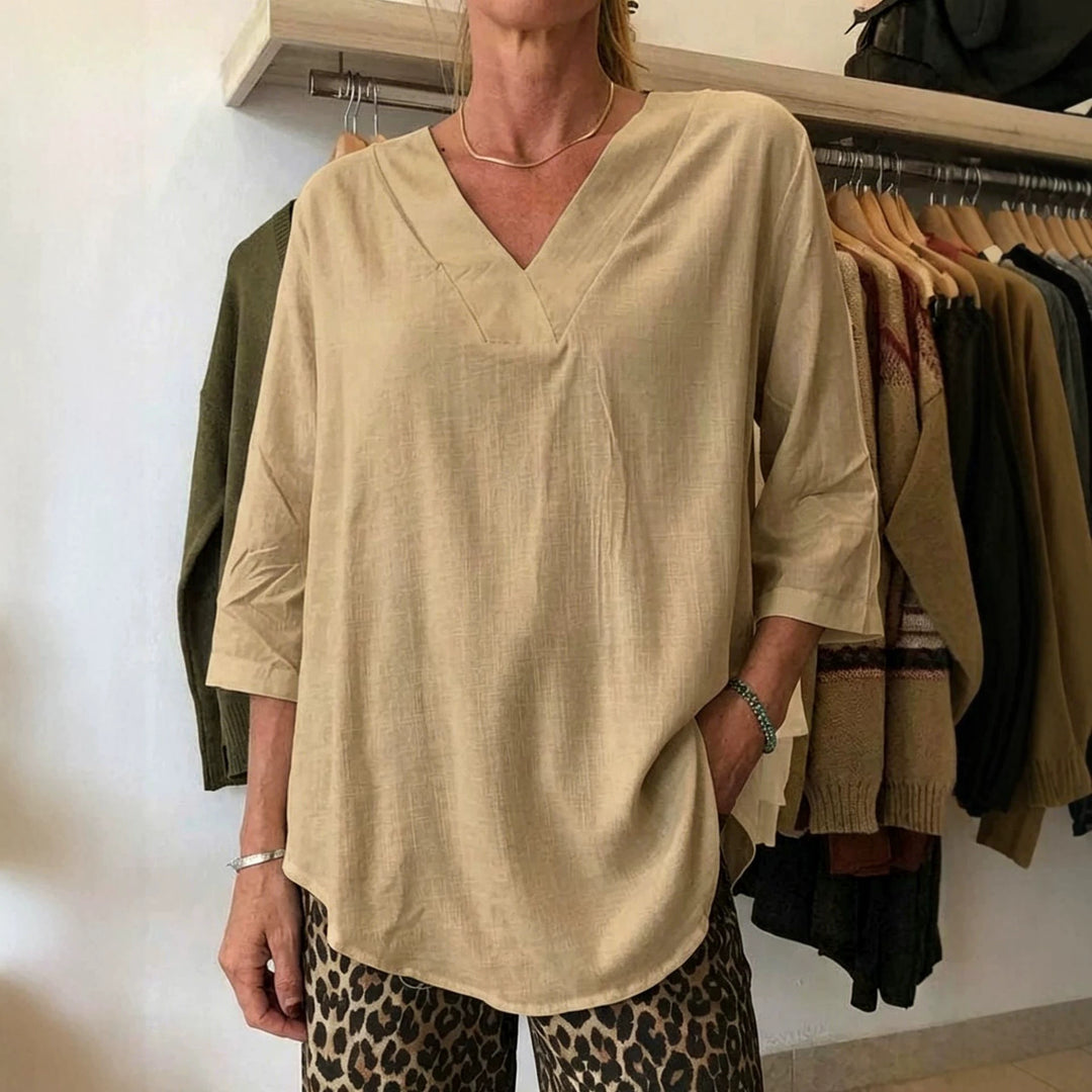 Damen Leichte Oversize V-Ausschnitt Tunika in Leinenoptik mit dreiviertel Ärmeln und abgerundetem Saum Shop Nory