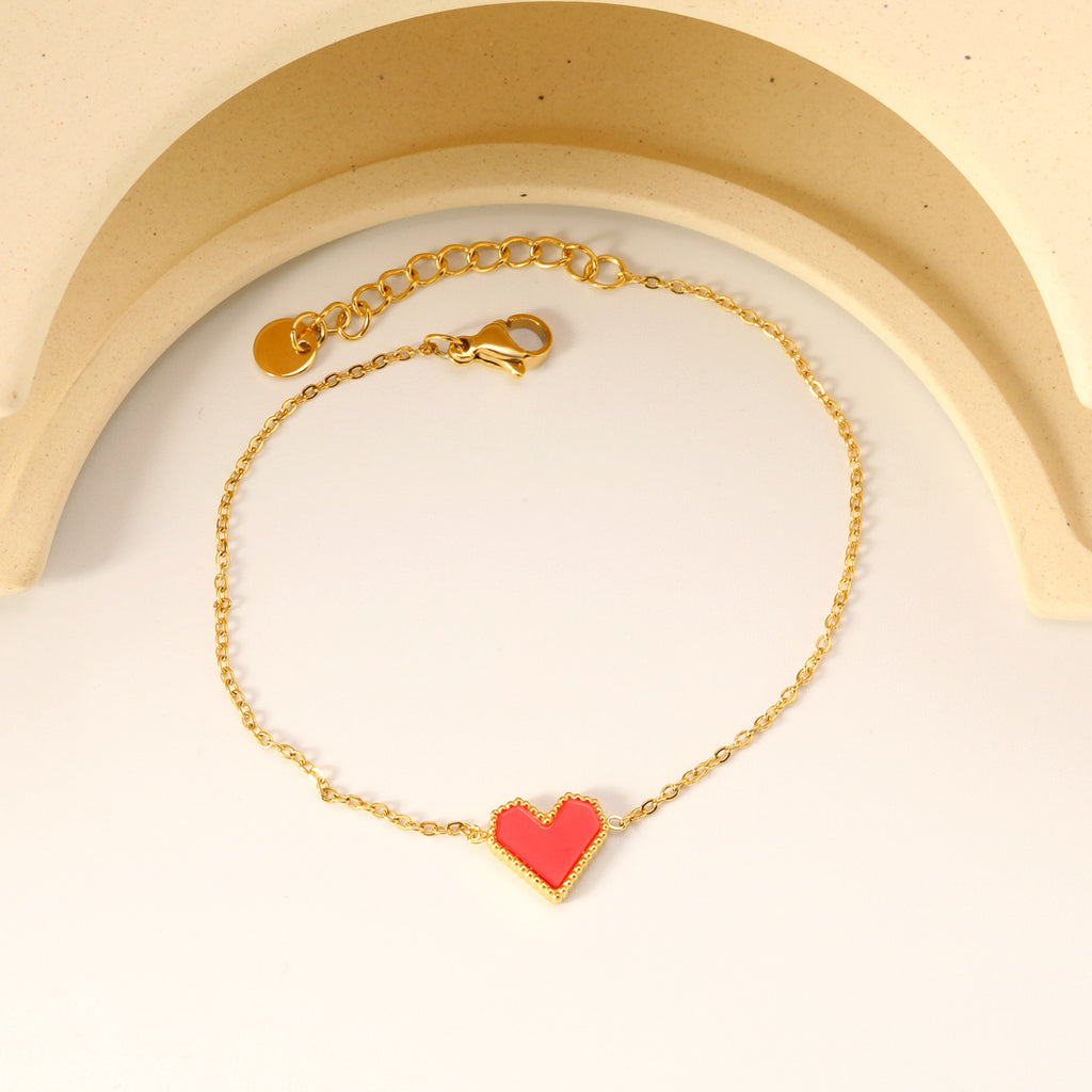 Damen Armband mit herzförmigem Anhänger und feiner Gliederstruktur Shop Nory
