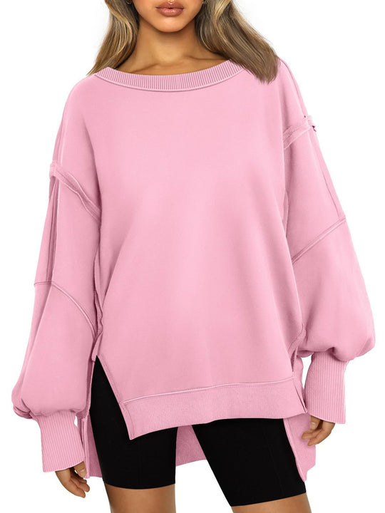 Damen Weiches Longline-Sweatshirt mit Ballonärmeln, seitlichen Schlitzen und geripptem Saum Shop Nory