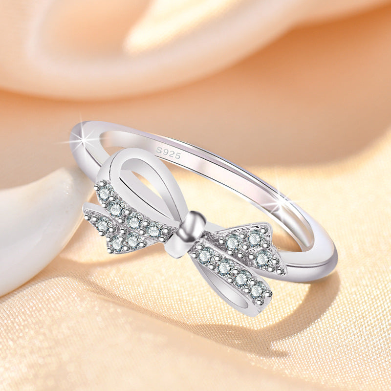 Damenring mit kunstvollem Schleifen-Design und Zirkonia-Details Shop Nory