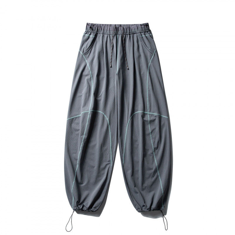 Unisex Locker geschnittene Tech-Jogginghose mit elastischem Bund, markanten Flatlock-Nähten und Kordelzug Shop Nory
