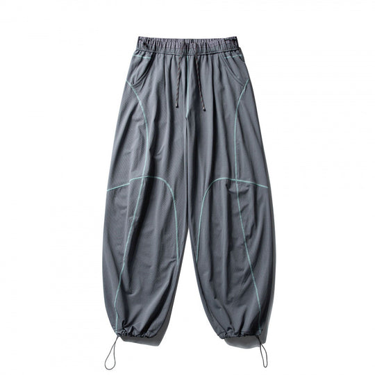 Unisex Locker geschnittene Tech-Jogginghose mit elastischem Bund, markanten Flatlock-Nähten und Kordelzug Shop Nory