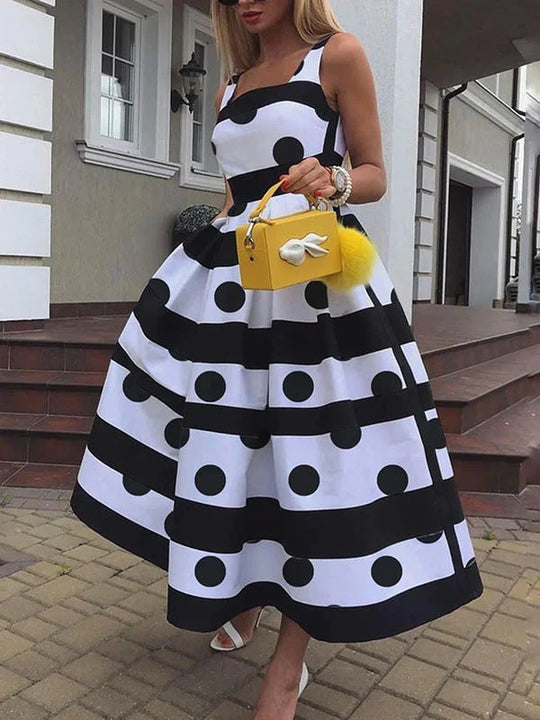 Damen Elegantes Midi-Kleid mit strukturiertem Polka-Dot-Design und schwingendem Rock Shopnory