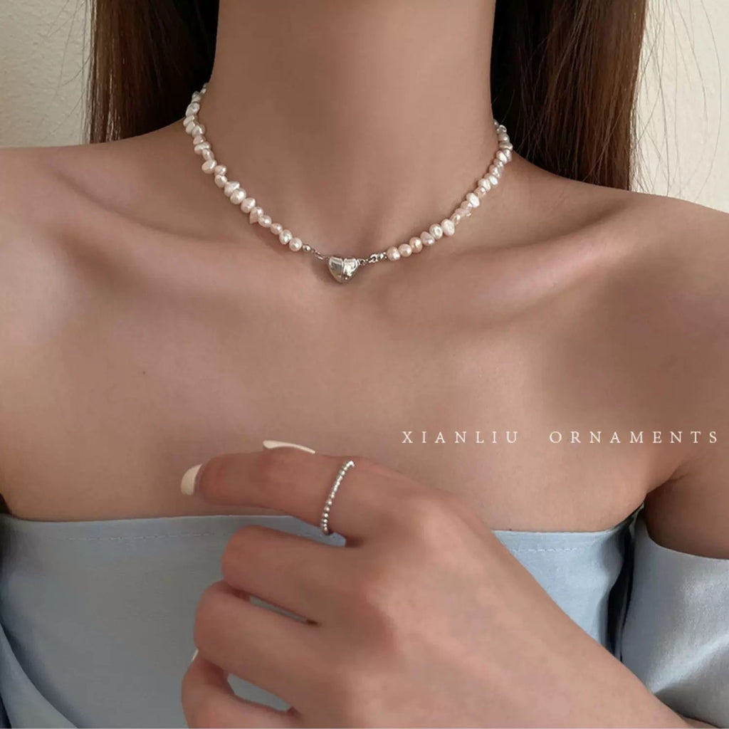 Damen Armband mit handgefertigten Perlen und herzförmigem Anhänger Shop Nory