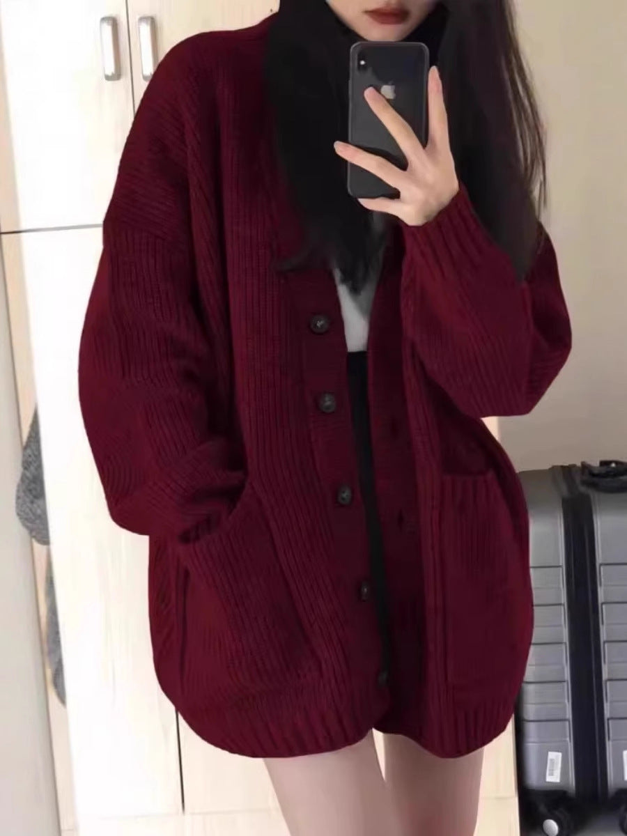 Damen Oversize Strickcardigan mit aufgesetzten Taschen und durchgehender Knopfleiste Shop Nory