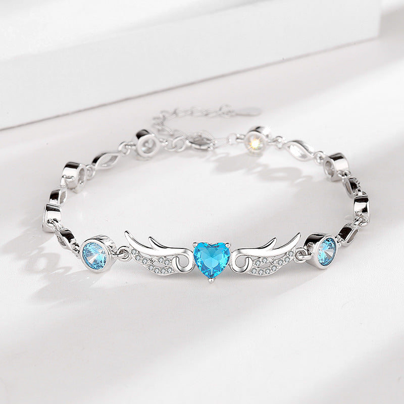 Damen Armband mit elegantem Herzanhänger und funkelnden Zirkonia-Steinen Shop Nory