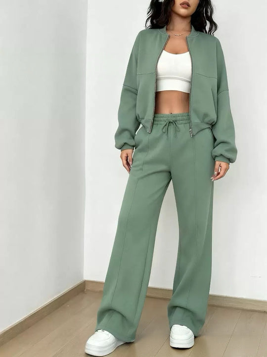 Damen nan kurz geschnittenes Blouson mit Reißverschluss und weiter High-Waist Jogginghose Set Shop Nory