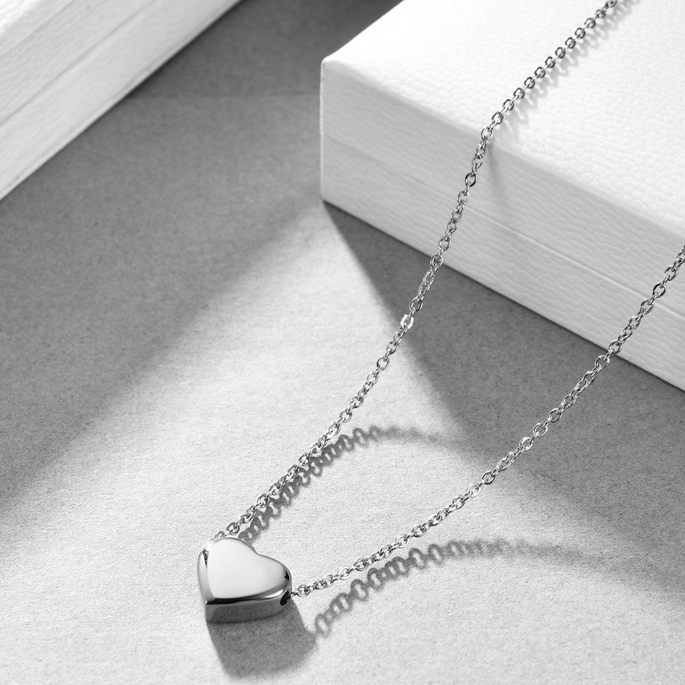 Damen Doppelhalskette mit herzförmigem Anhänger und filigranem Kettendesign Shop Nory