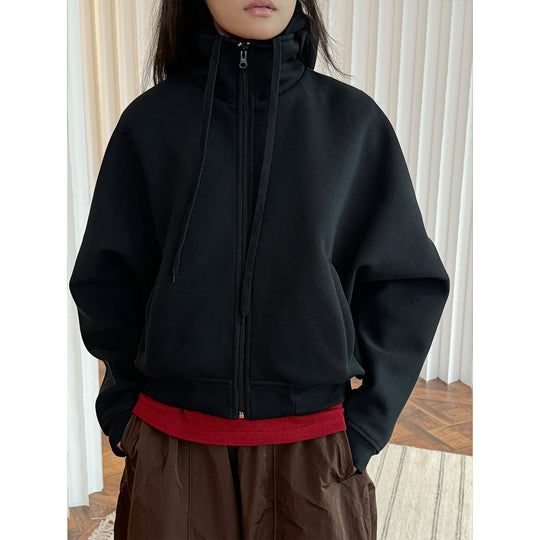 Damen Kurz geschnittene Kapuzenjacke mit hohem Schlauchkragen und Ballonärmeln Shop Nory